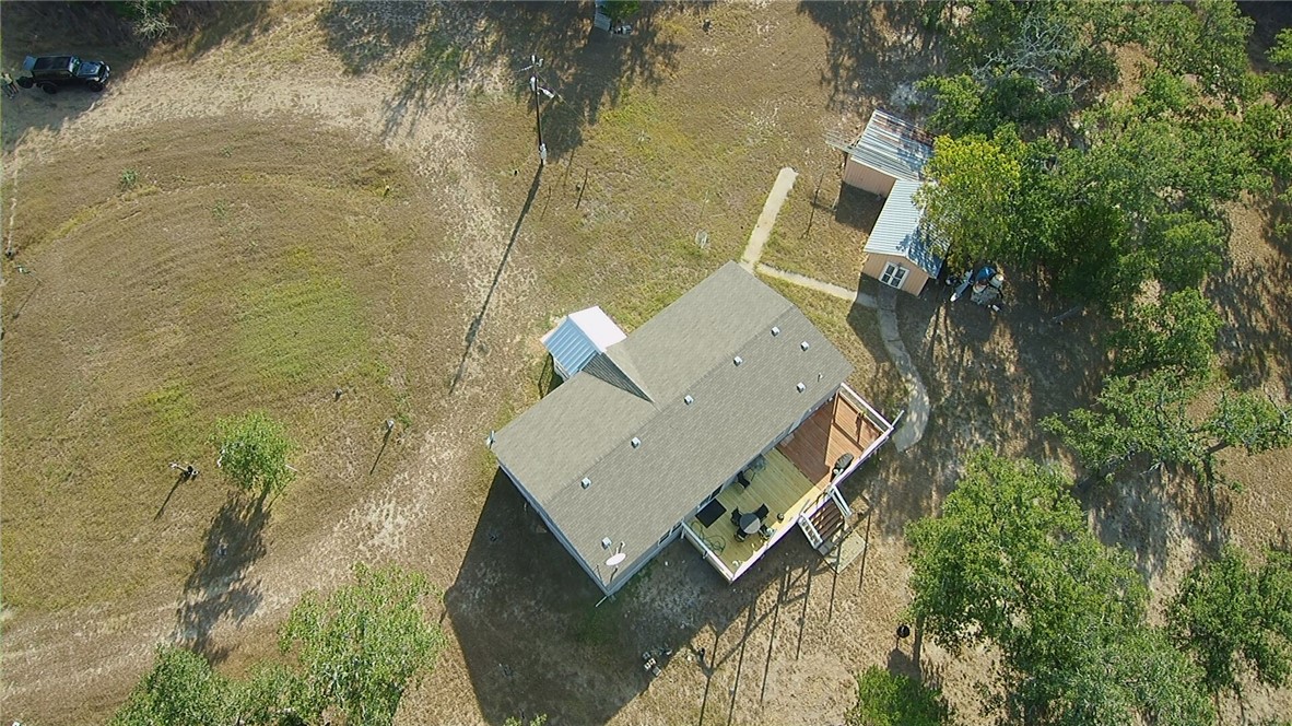 401 Raiders Road Somerville, TX 77879 - Photo 29 of 30 an aerial view of house with yard