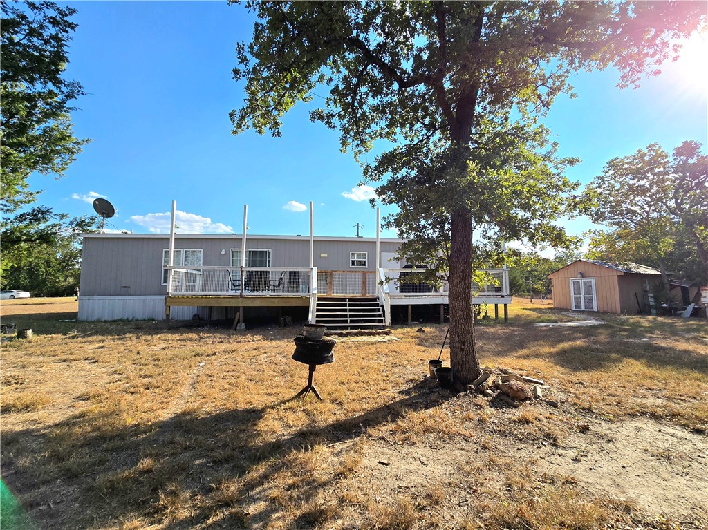 401 Raiders Road Somerville, TX 77879 - Photo 6 of 30 a front view of a house with a yard