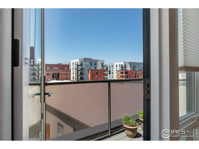 a balcony with a city view