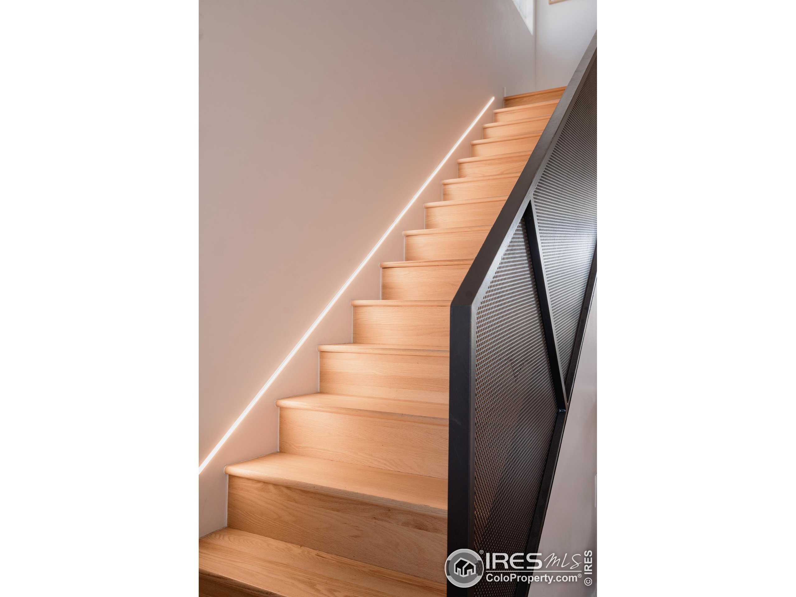 401 Linden Street, Unit 3336 Fort Collins, CO 80524 - Photo 15 of 38 a view of staircase with white walls