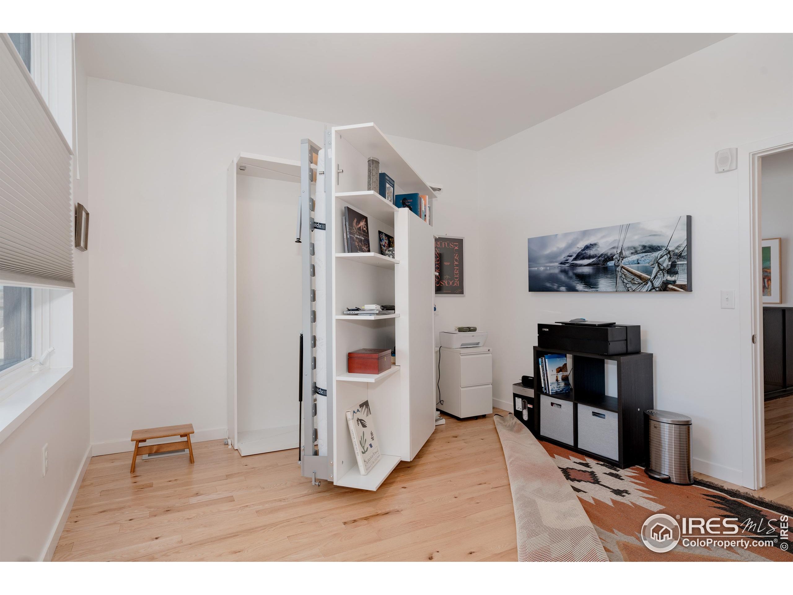 401 Linden Street, Unit 3336 Fort Collins, CO 80524 - Photo 22 of 38 a living room with furniture and a flat screen tv