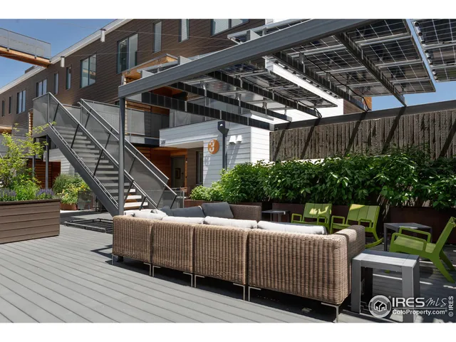 a view of a terrace with furniture