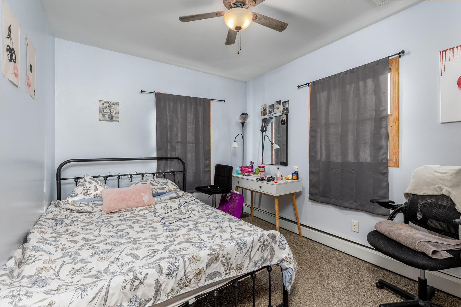 415 North Sycamore Street Somonauk, IL 60552 - Photo 16 of 18 a bedroom with a bed and a chandelier