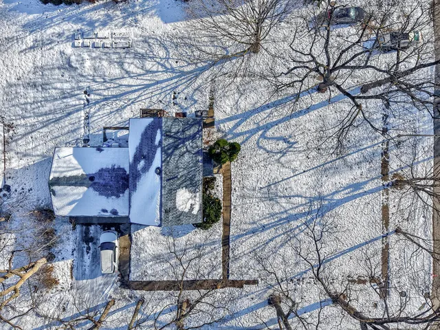 a view of a backyard with a lake view
