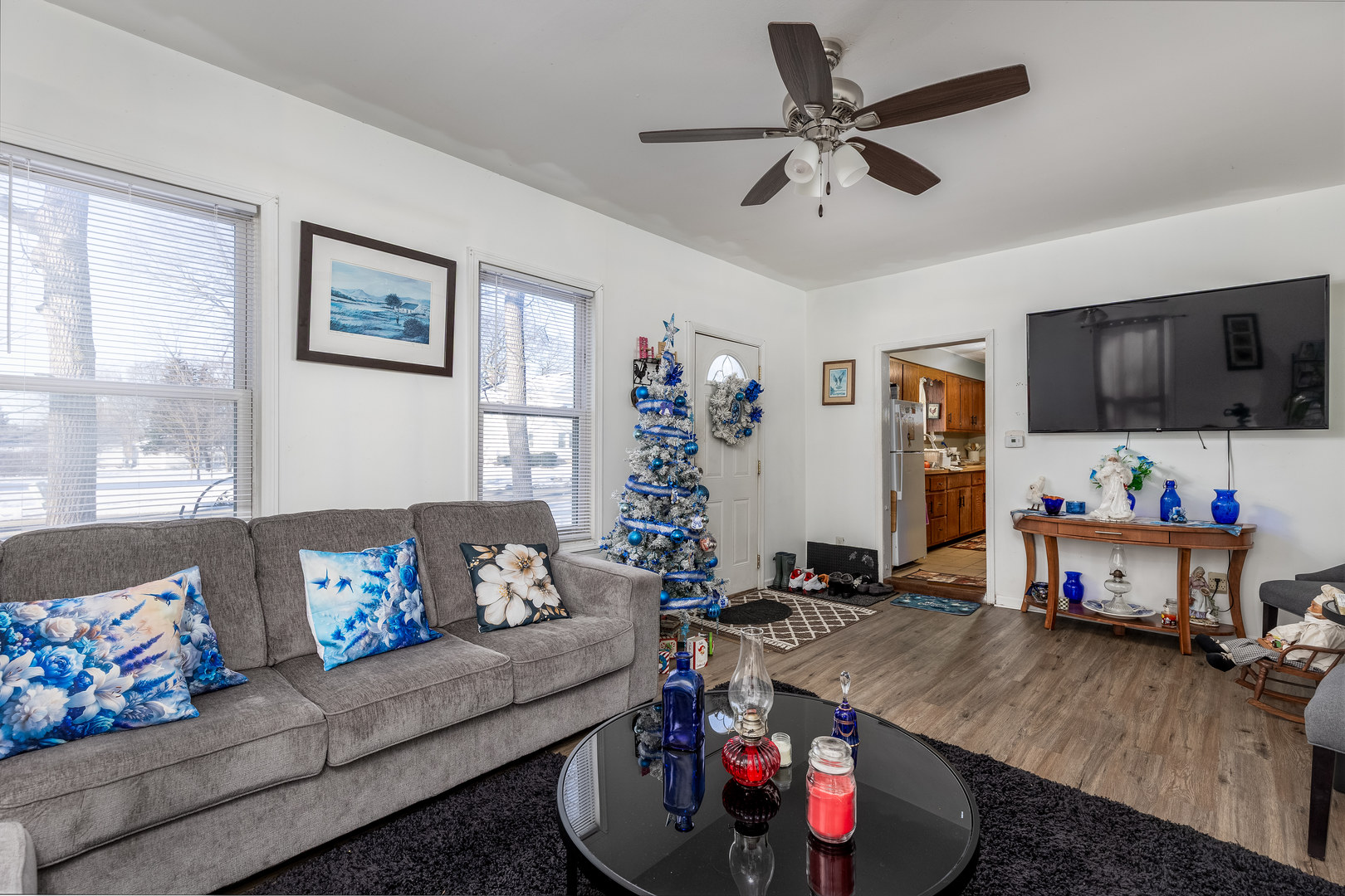 415 North Sycamore Street Somonauk, IL 60552 - Photo 2 of 18 a living room with furniture and a flat screen tv
