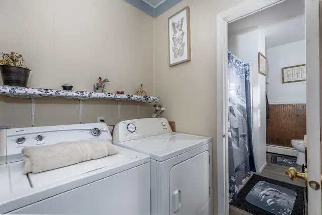 a utility room with dryer and washer