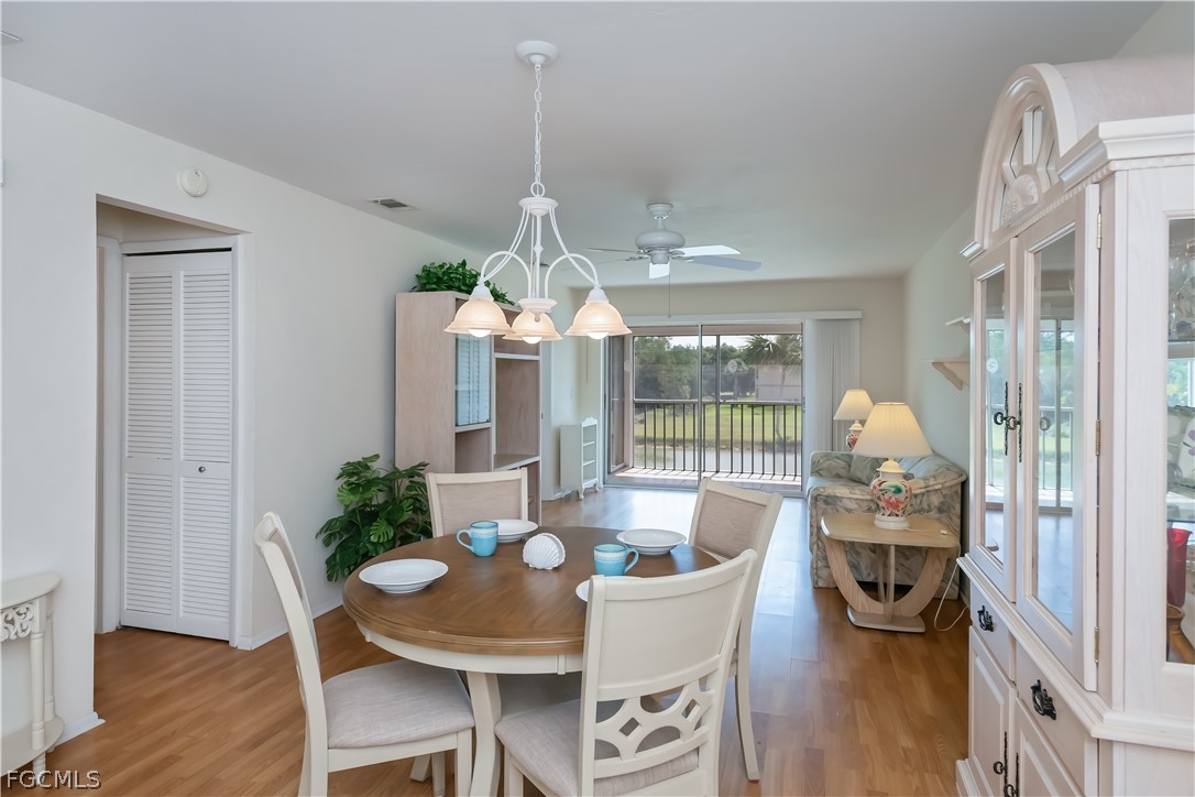 1100 Pondella Road, Unit 514 Cape Coral, FL 33909 - Photo 8 of 34 a very nice looking dining room with a table and chairs