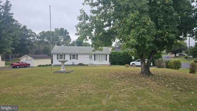 a house view with a garden space