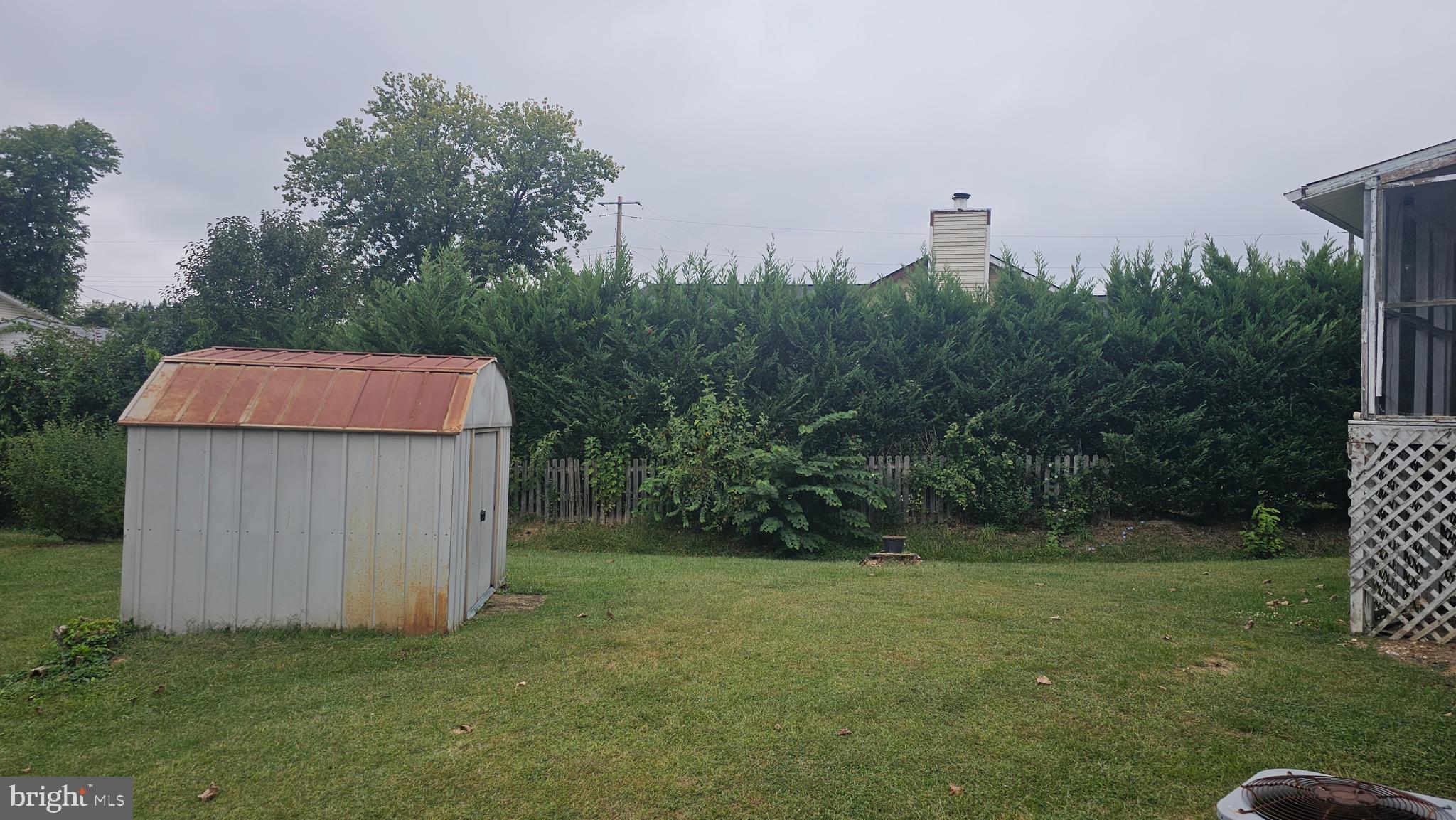 331 Dogwood Road Winchester, VA 22602 - Photo 15 of 16 a backyard of a house with lots of green space