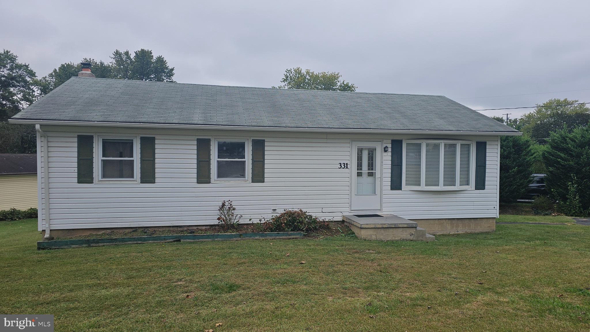 331 Dogwood Road Winchester, VA 22602 - Photo 2 of 16 a front view of a house with a yard