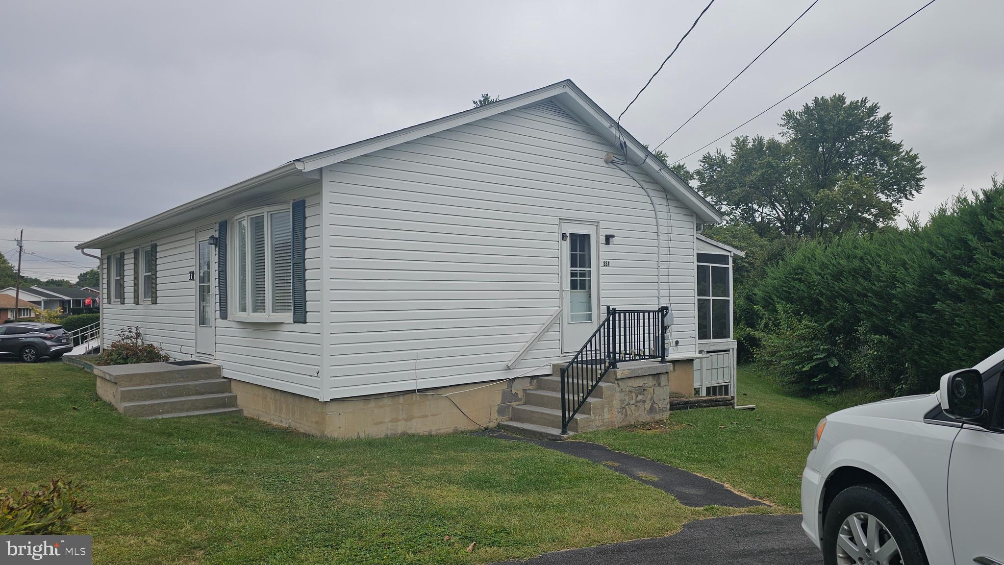 331 Dogwood Road Winchester, VA 22602 - Photo 4 of 16 a view of a house with a backyard