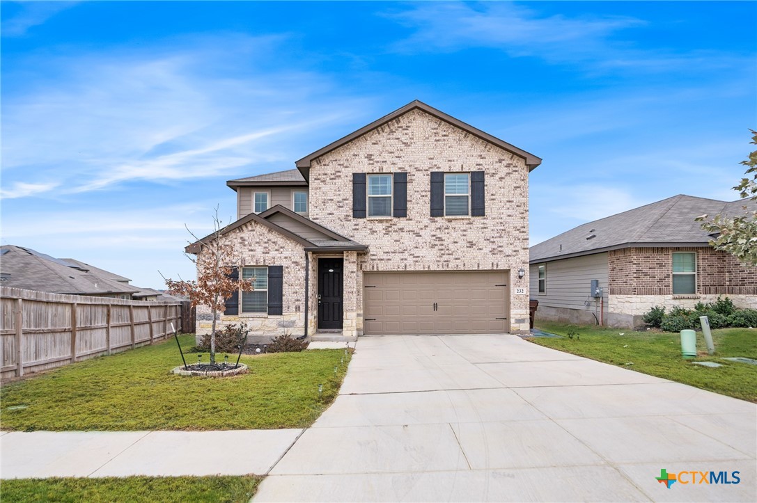 232 Colebrook Way Cibolo, TX 78108 - Photo 1 of 42 a front view of a house with a yard