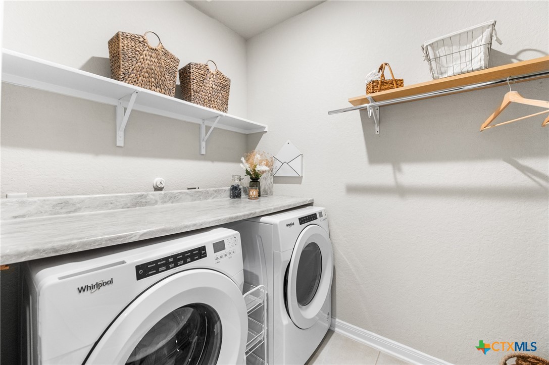 232 Colebrook Way Cibolo, TX 78108 - Photo 25 of 42 a utility room with dryer and washer