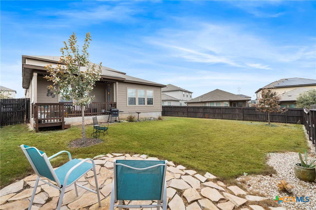 232 Colebrook Way Cibolo, TX 78108 - Photo 41 of 42 a swimming pool with outdoor seating and yard