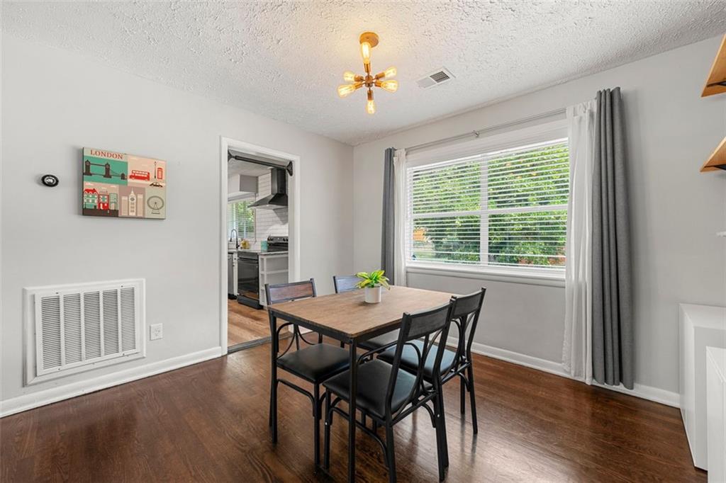 2268 Shamrock Drive Decatur, GA 30032 - Photo 12 of 31 a view of a dining room with furniture window and wooden floor