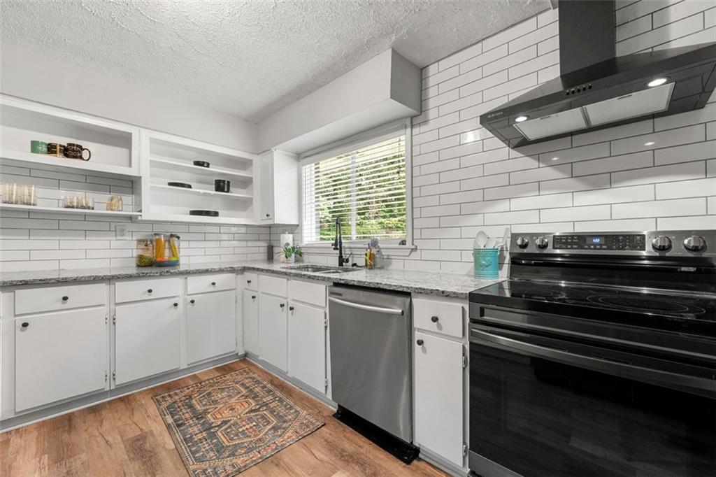 2268 Shamrock Drive Decatur, GA 30032 - Photo 14 of 31 a kitchen with appliances cabinets and a sink
