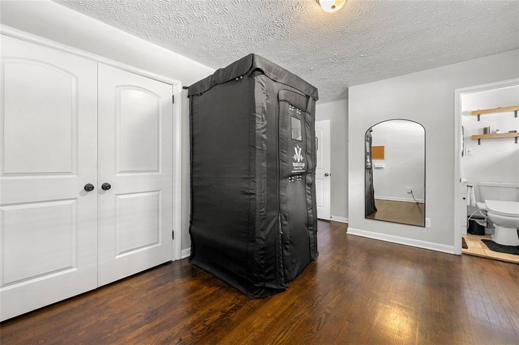 2268 Shamrock Drive Decatur, GA 30032 - Photo 25 of 31 a view of a big room with wooden floor and entryway