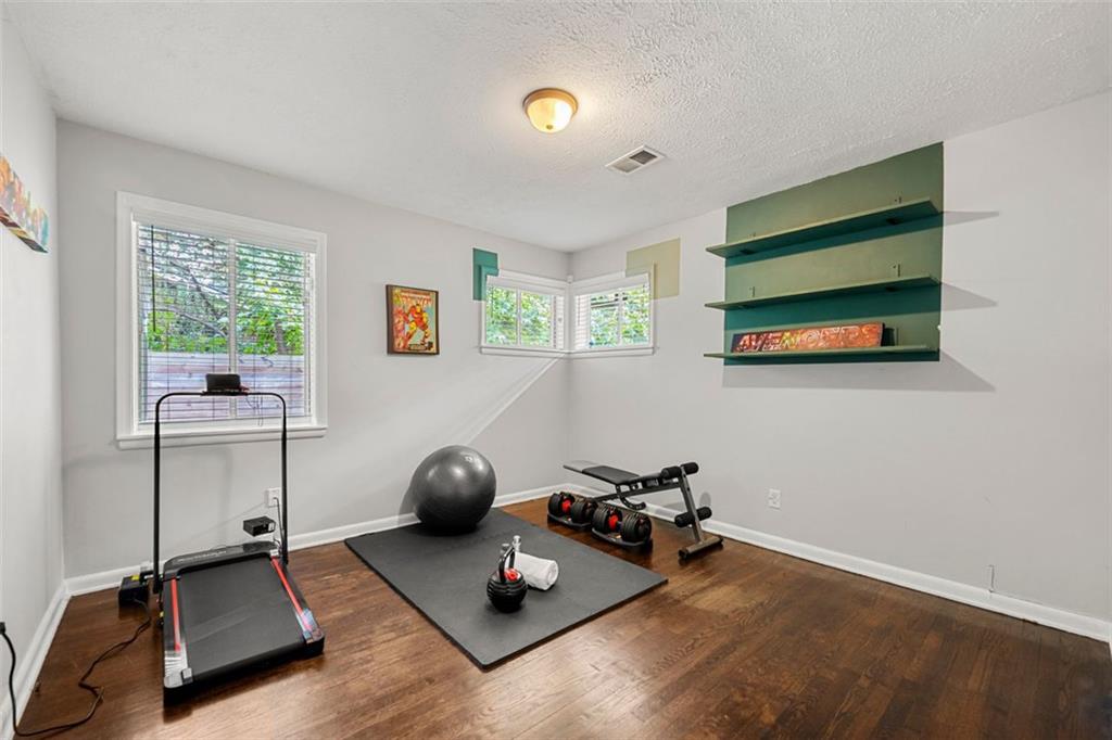 2268 Shamrock Drive Decatur, GA 30032 - Photo 27 of 31 a room with gym equipment and a large window