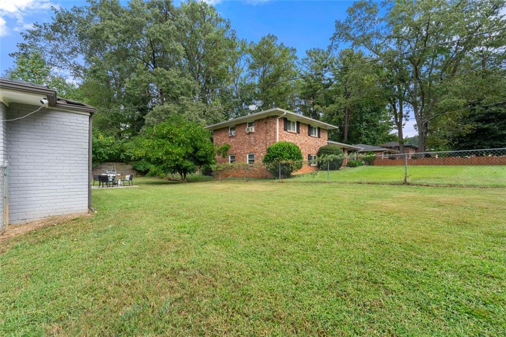 2268 Shamrock Drive Decatur, GA 30032 - Photo 30 of 31 a view of a house with a yard