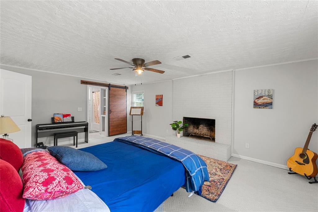 2268 Shamrock Drive Decatur, GA 30032 - Photo 4 of 31 a bedroom with furniture and a piano