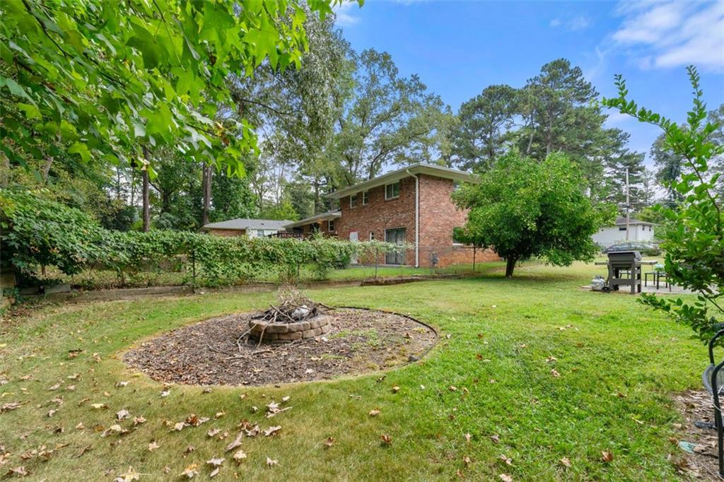 2268 Shamrock Drive Decatur, GA 30032 - Photo 5 of 31 a view of a backyard with large trees