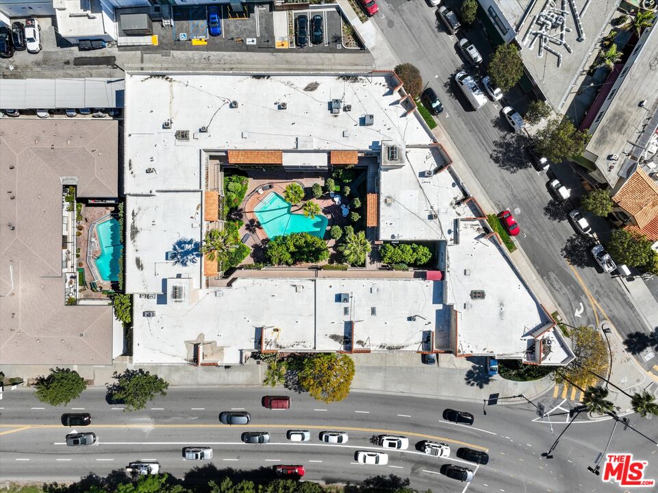 11670 Sunset Boulevard, Unit 303 Los Angeles, CA 90049 - Photo 32 of 32 an aerial view of residential houses with outdoor space