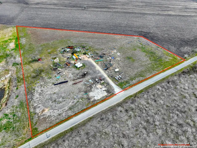 a view of a garden from a balcony