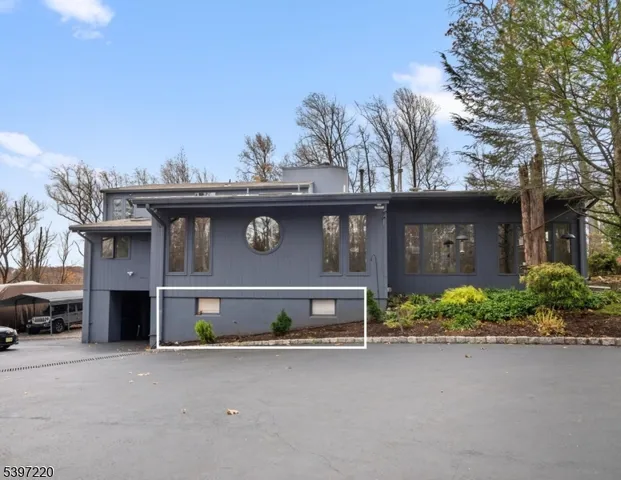 a view of a car park in front of a building