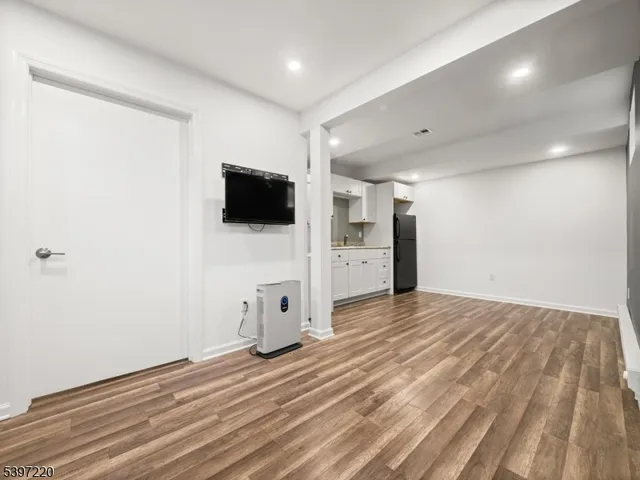 a view of a livingroom with a flat screen tv