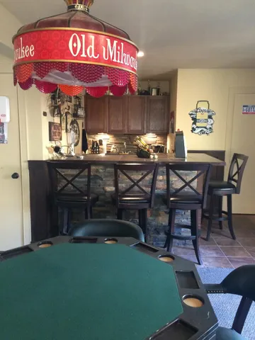 a view of a cafe with table and chairs
