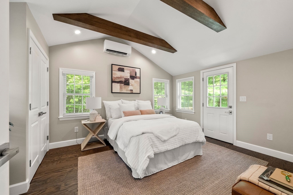 16 Churchill Road Plympton, MA 02367 - Photo 13 of 42 a spacious bedroom with a bed and a window