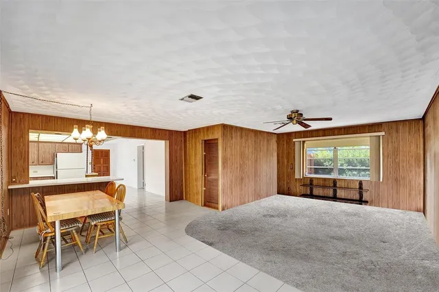 a view of a livingroom with furniture and window