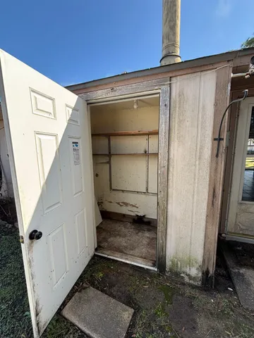 a view of entryway with wooden floor