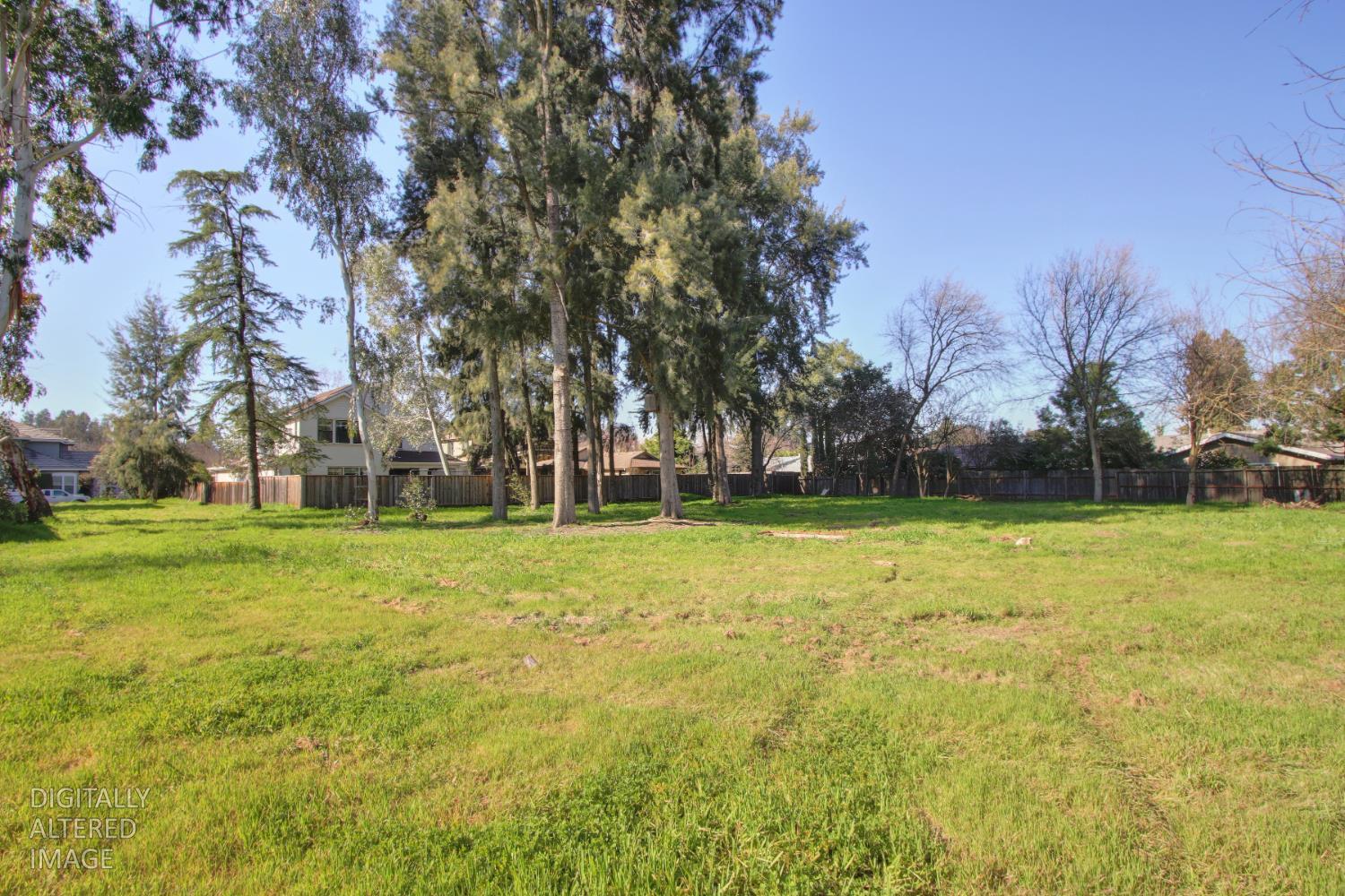 1136 Los Robles Street Davis, CA 95618 - Photo 1 of 11 a view of outdoor space with playground and trees