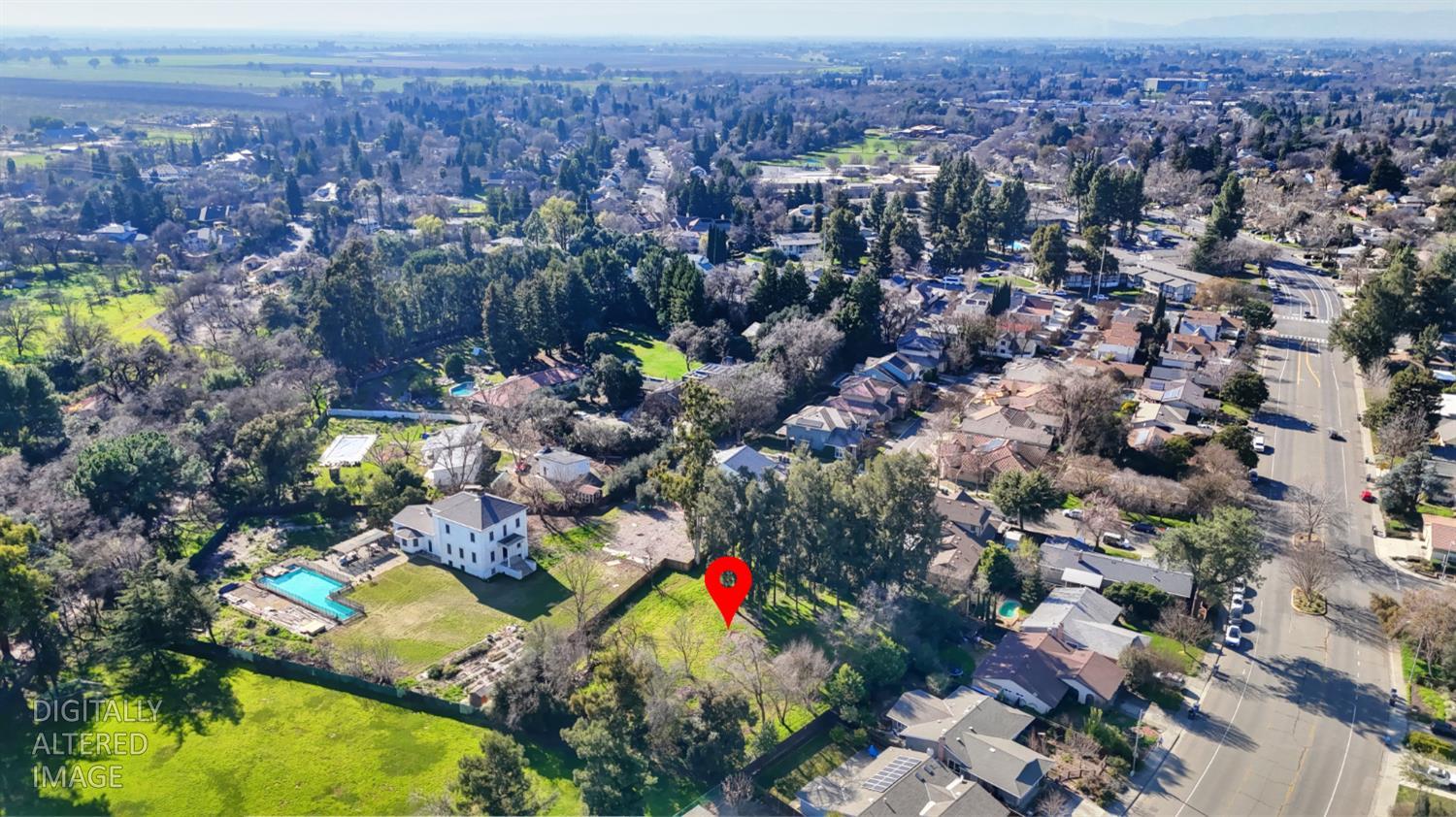 1136 Los Robles Street Davis, CA 95618 - Photo 3 of 11 an aerial view of residential houses with outdoor space and swimming pool