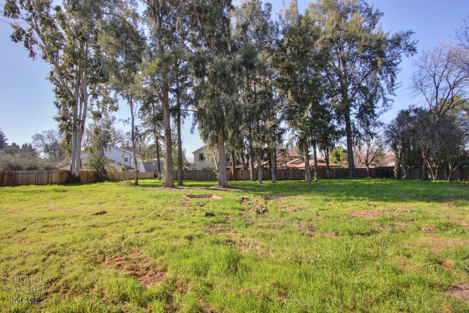 1136 Los Robles Street Davis, CA 95618 - Photo 4 of 11 a fire hydrant in the middle of a field