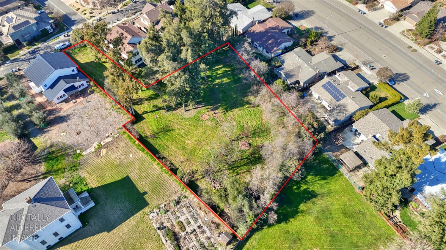 1136 Los Robles Street Davis, CA 95618 - Photo 5 of 11 an aerial view of a house with a yard