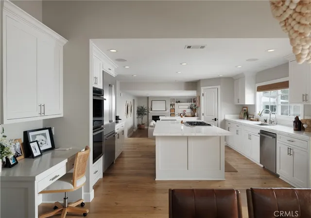 a kitchen with counter top space and appliances
