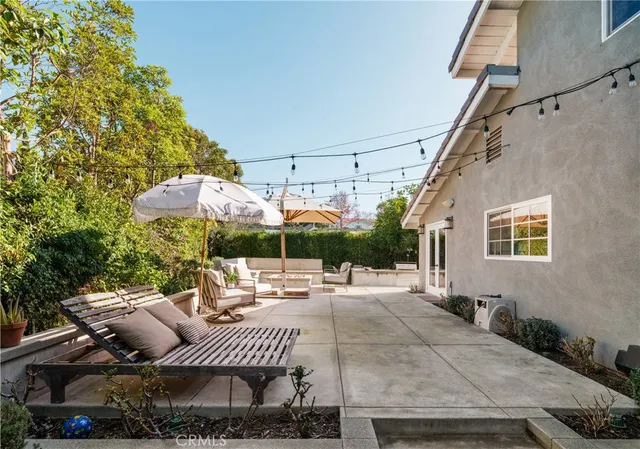 a outdoor space with lots of white furniture