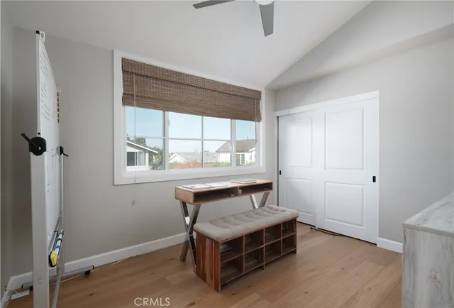 a room with a bed and a window