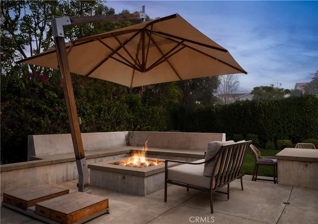 a view of swimming pool with a patio