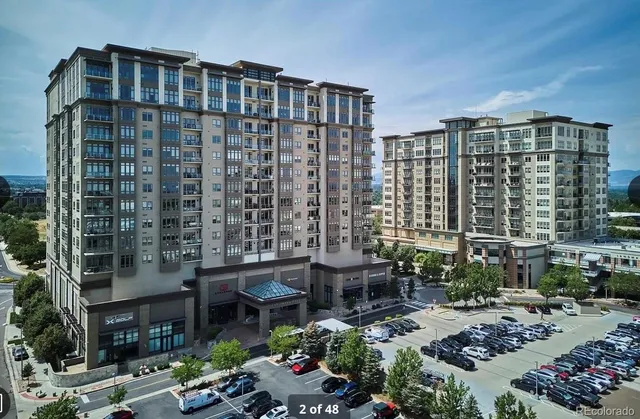 a view of a chairs and table in a patio
