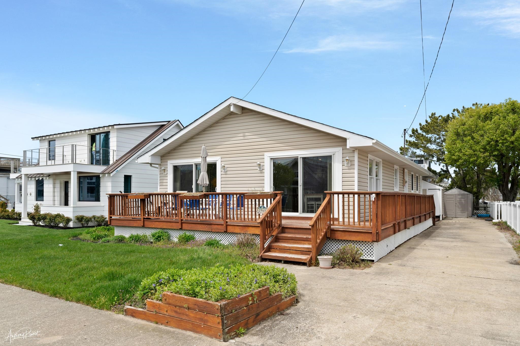 2968 First Avenue Avalon, NJ 08202 - Photo 1 of 23 a view of a house with backyard and sitting area