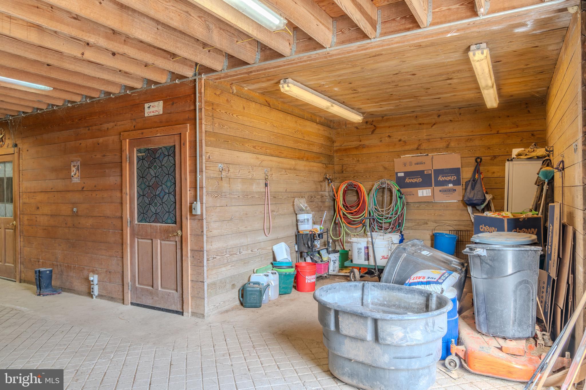 4503 Scotch Valley Road Hollidaysburg, PA 16648 - Photo 67 of 85 a room with water heater and wooden walls