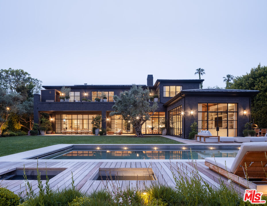 a view of a building with a yard