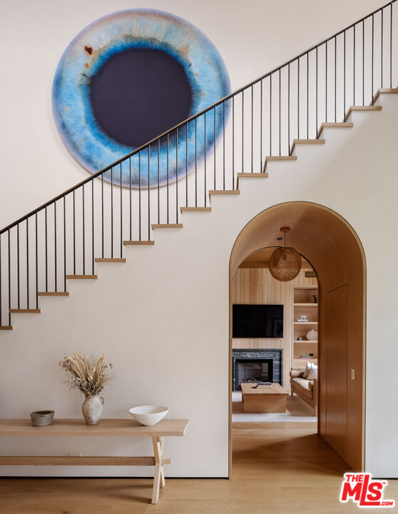 250 South Rockingham Avenue Los Angeles, CA 90049 - Photo 12 of 20 a view of entryway and hall with wooden floor