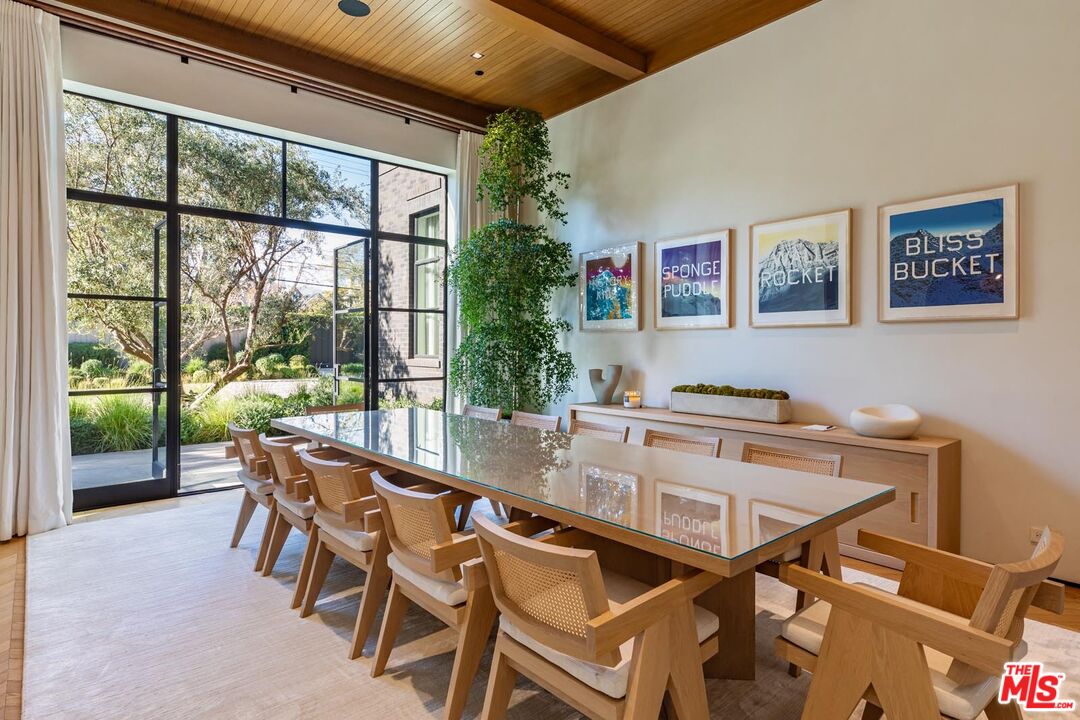 250 South Rockingham Avenue Los Angeles, CA 90049 - Photo 3 of 20 a dining room with furniture and window