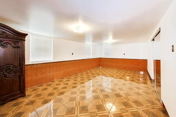 a view of a livingroom with a furniture and a rug