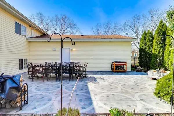 a view of a backyard with a garden