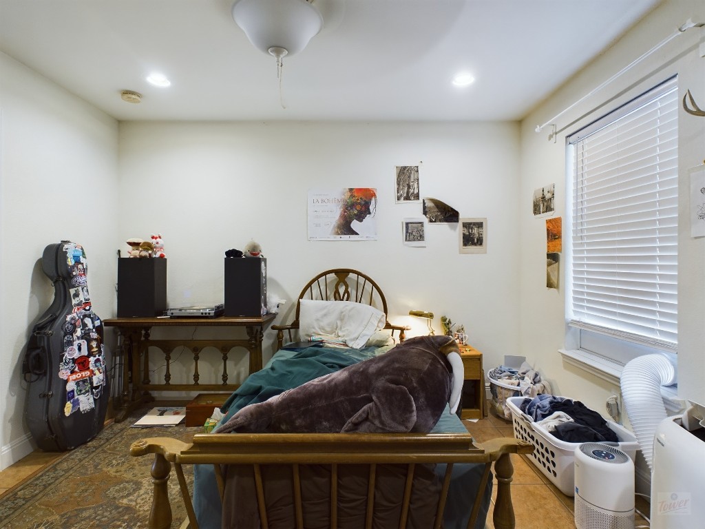 500 East 48th Street, Unit B Austin, TX 78751 - Photo 16 of 32 a living room with furniture and a fireplace